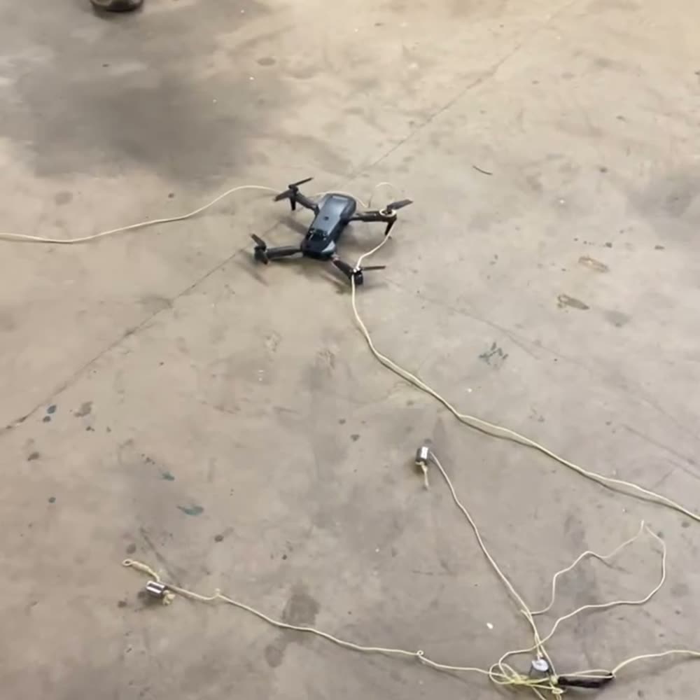 Target drone grounded and entangled following a capture-system trial